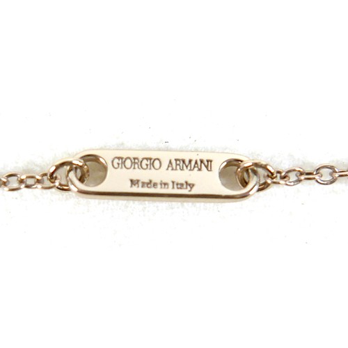 155 - A Giorgio Armani 18ct gold bracelet, with G logo lozenges, lobster clasp, with box and fabric bag, a... 