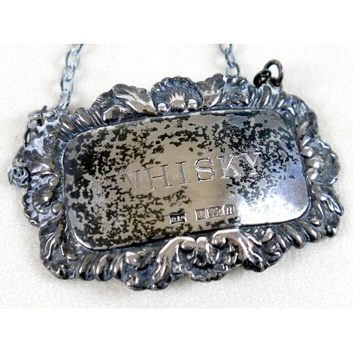 158 - Two Elizabeth II silver decanter labels, inscribed 'Brandy' and 'Whisky', Birmingham 1976 and 1978, ... 