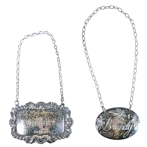 158 - Two Elizabeth II silver decanter labels, inscribed 'Brandy' and 'Whisky', Birmingham 1976 and 1978, ... 