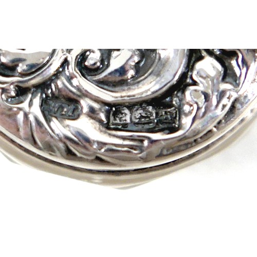 169 - A white metal eastern vase and two small silver top glass pots, the vase of baluster form decorated ... 