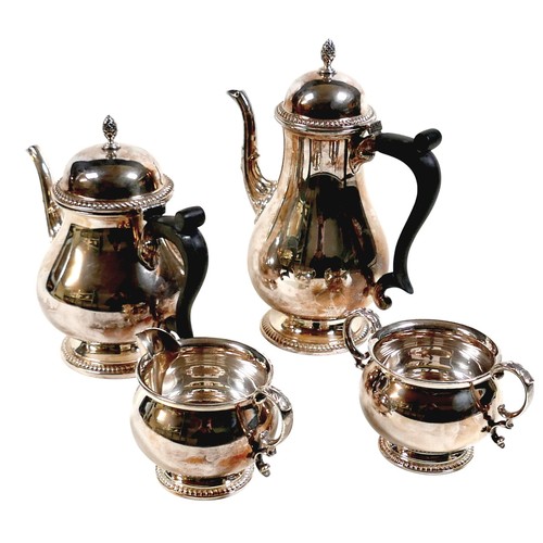 172 - An Elizabeth II silver four piece tea and coffee service, of baluster form with gadrooned rim and ac... 