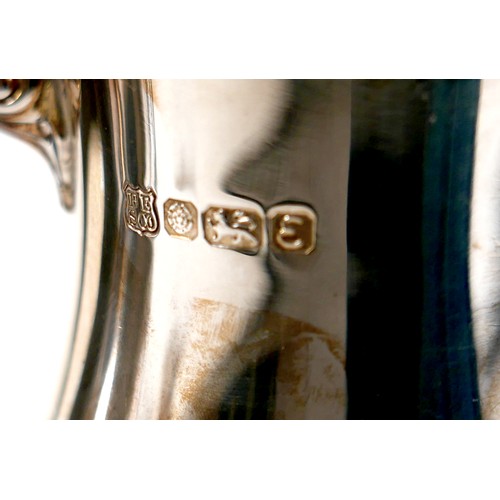 172 - An Elizabeth II silver four piece tea and coffee service, of baluster form with gadrooned rim and ac... 