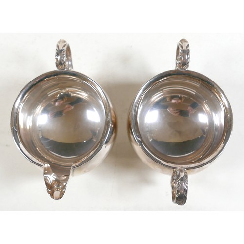 172 - An Elizabeth II silver four piece tea and coffee service, of baluster form with gadrooned rim and ac... 