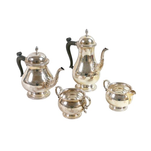 172 - An Elizabeth II silver four piece tea and coffee service, of baluster form with gadrooned rim and ac...