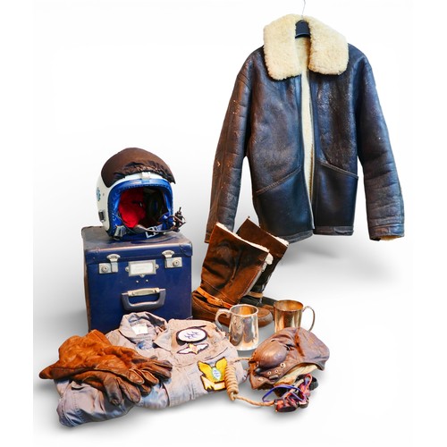 187 - A collection of aviation items including a flying helmet with fitted hard case, a vintage leather fl... 