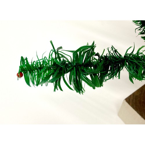 188 - A rare artificial table Christmas tree, circa 1920's, with dyed green goose feather 'leaves / needle... 