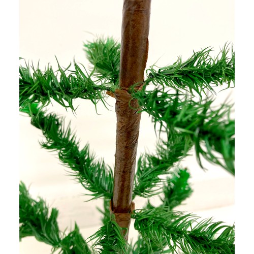 188 - A rare artificial table Christmas tree, circa 1920's, with dyed green goose feather 'leaves / needle... 