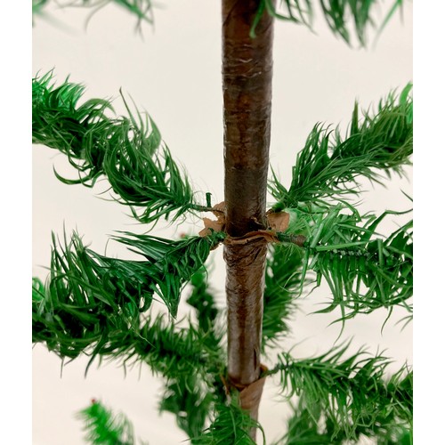 188 - A rare artificial table Christmas tree, circa 1920's, with dyed green goose feather 'leaves / needle... 