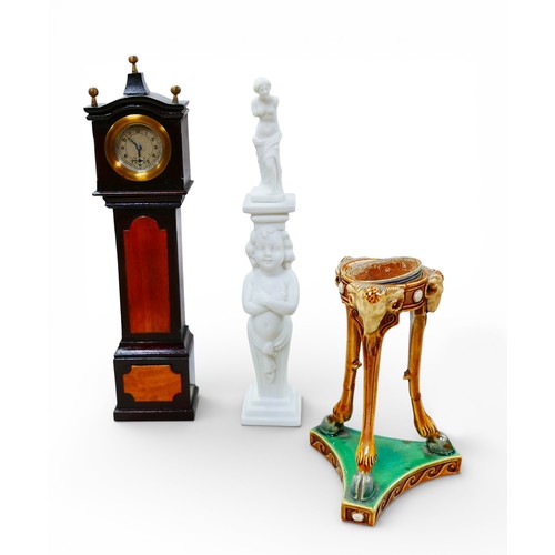 77 - A group of doll's house furnishings, including a Mintons style jardiniere stand, a long case clock, ... 