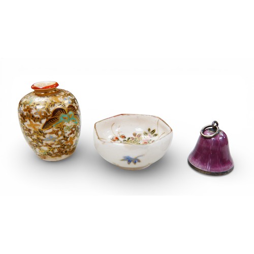 76 - A group of doll's house furnishings and accessories, including a two pieces of miniature Satsuma sty... 