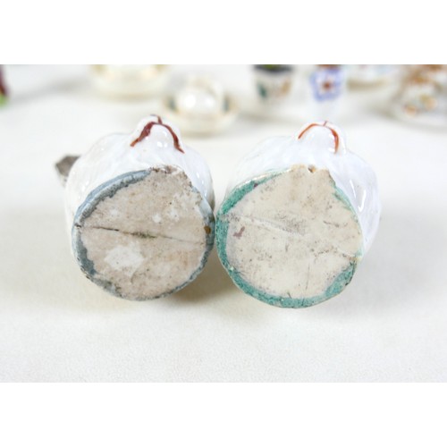 53 - A collection of miniature ceramics, including nine Staffordshire & Continental figures, modelled as ... 