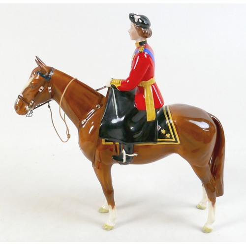 331 - A Beswick model of HM Queen Elizabeth II mounted on Imperial, Trooping the Colour 1957, 26cm high.
