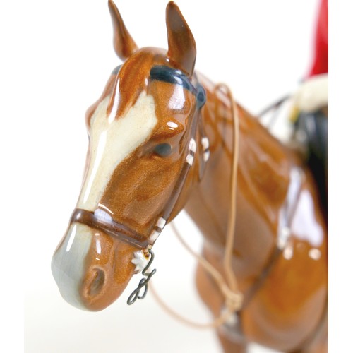 331 - A Beswick model of HM Queen Elizabeth II mounted on Imperial, Trooping the Colour 1957, 26cm high.