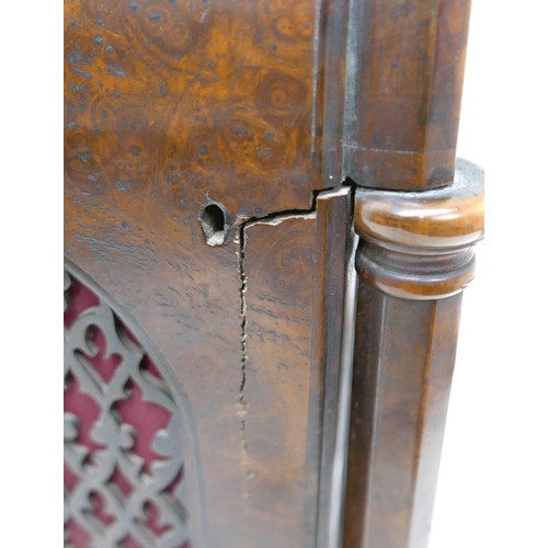 412 - A Victorian burr walnut gothic revival bracket / table clock, domed case with octagonal pillars and ... 