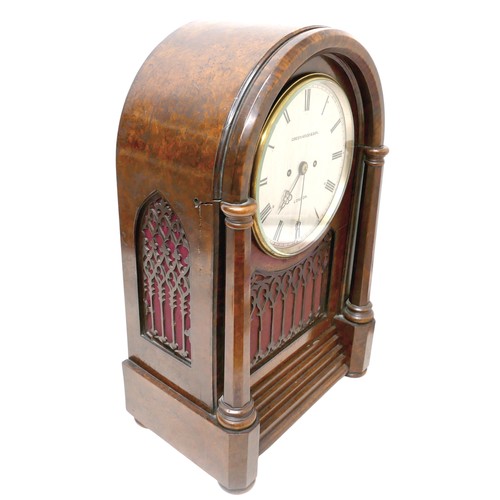 412 - A Victorian burr walnut gothic revival bracket / table clock, domed case with octagonal pillars and ... 
