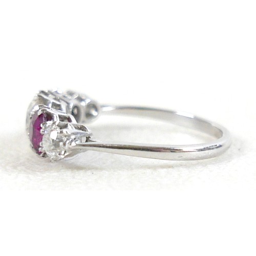 179 - A platinum five stone diamond and ruby ring, the central diamond approximately 0.75ct flanked by sma... 