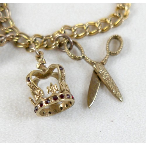 174 - A 9ct yellow gold charm bracelet with eight charms, 25.7g.