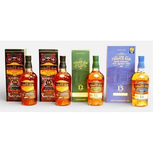 66 - Four bottles of The Temple Bar Irish whiskey, including a bottle of 15 year old, bottle No. 3210, al... 