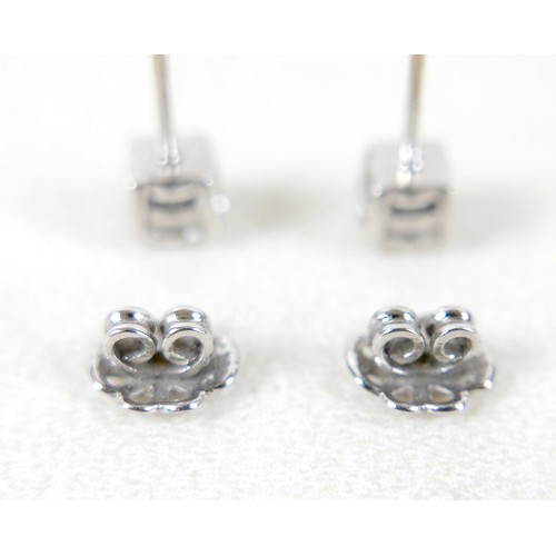 177 - A pair of diamond solitaire stud earrings, set in 18ct white gold, each stone approx. 0.7ct, SI2, co... 
