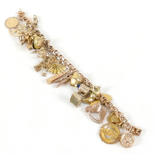 176 - A 9ct gold charm bracelet with assorted 9ct gold, 18ct and gilt metal charms, including 9ct Melton M... 