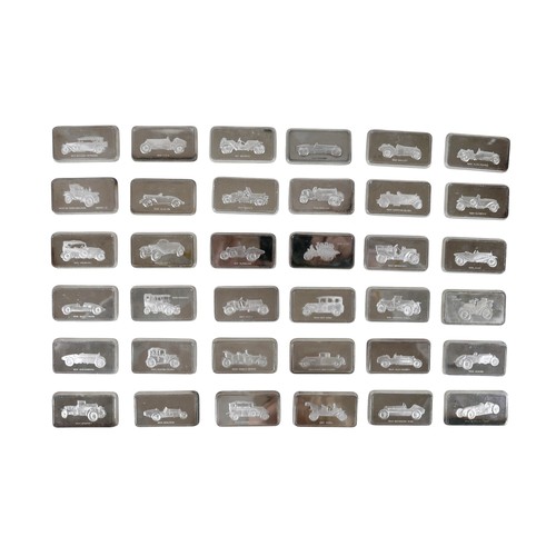 228 - A collection of thirty-six silver ingots, commemorating the collection at 'The National Motor Museum... 
