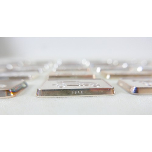 228 - A collection of thirty-six silver ingots, commemorating the collection at 'The National Motor Museum... 