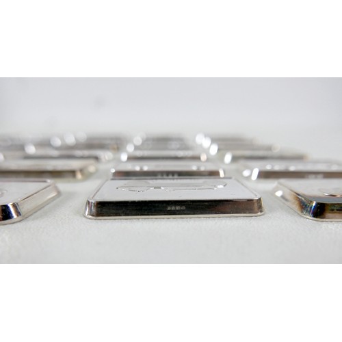 228 - A collection of thirty-six silver ingots, commemorating the collection at 'The National Motor Museum... 