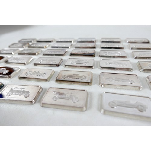 228 - A collection of thirty-six silver ingots, commemorating the collection at 'The National Motor Museum... 