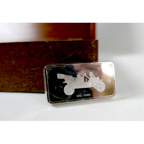 228 - A collection of thirty-six silver ingots, commemorating the collection at 'The National Motor Museum... 