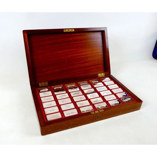 228 - A collection of thirty-six silver ingots, commemorating the collection at 'The National Motor Museum... 
