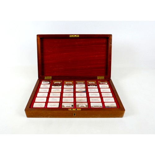 228 - A collection of thirty-six silver ingots, commemorating the collection at 'The National Motor Museum... 