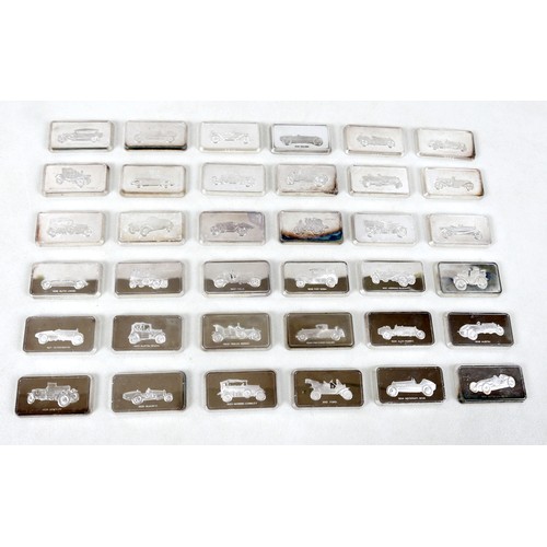 228 - A collection of thirty-six silver ingots, commemorating the collection at 'The National Motor Museum... 