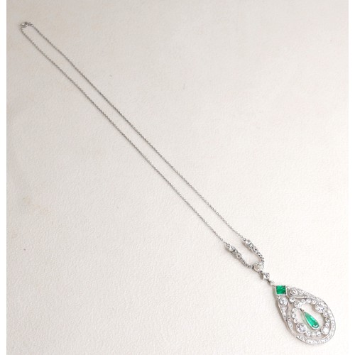172 - A French Belle Epoque white metal pendant, circa 1900, set with diamonds and emeralds, of teardrop f... 