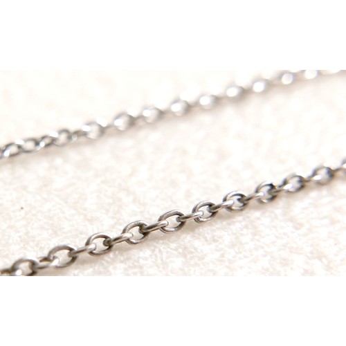 172 - A French Belle Epoque white metal pendant, circa 1900, set with diamonds and emeralds, of teardrop f... 