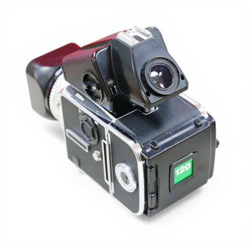283 - A Hasselblad 503 CW camera and accessories, including a PME 51 Prism viewfinder, and a 80mm lens, in... 
