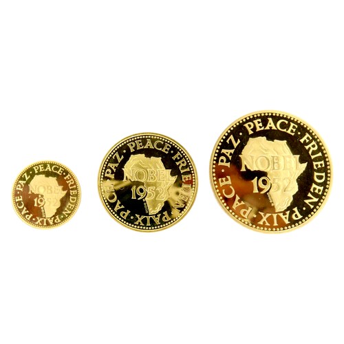 196 - Dr Albert Schweitzer  (1877-1965), set of three gold 22ct Medals, 1965, for Metalimport Ltd, bust th... 