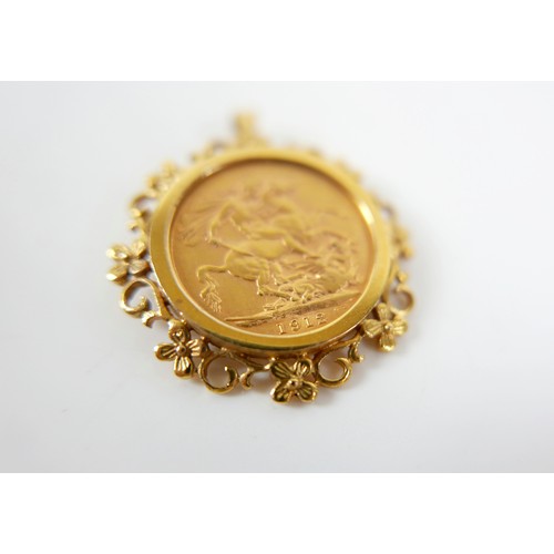 193 - A George V gold sovereign, 1912, in a 9ct gold coin pendant mount, 12.3g.