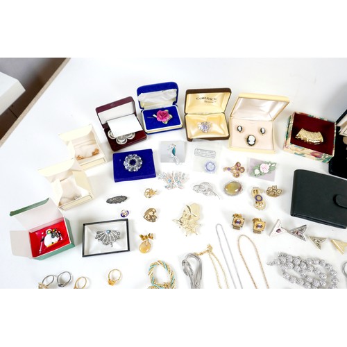 23 - A collection of costume jewellery, including some silver, approximately 0.5toz. (2 bags)