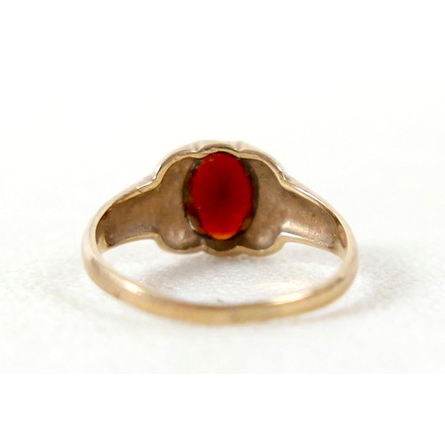 25 - A 9ct gold and garnet ring, size P, 2.3g, as well as 9ct gold necklace with a yellow metal 'Special ... 