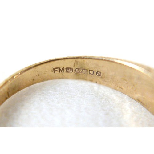 31 - A 9ct gold ring with initials 'GP', inlaid with a single diamond, approximately 1mm diameter, size X... 