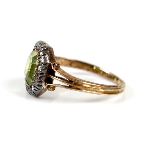 32 - An 18ct yellow gold peridot and diamond ring head size 10 by 10mm, ring size H, 2.2g.