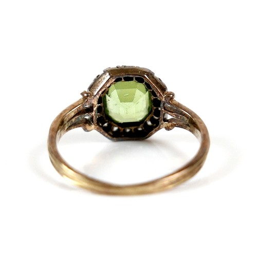 32 - An 18ct yellow gold peridot and diamond ring head size 10 by 10mm, ring size H, 2.2g.