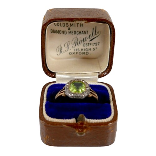 32 - An 18ct yellow gold peridot and diamond ring head size 10 by 10mm, ring size H, 2.2g.