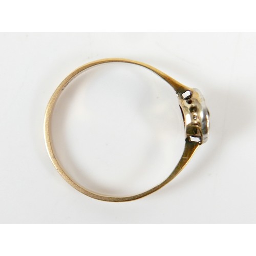 41 - An Edwardian 18ct yellow gold ring, set with nine diamonds in the form of a flowerhead, central ston... 