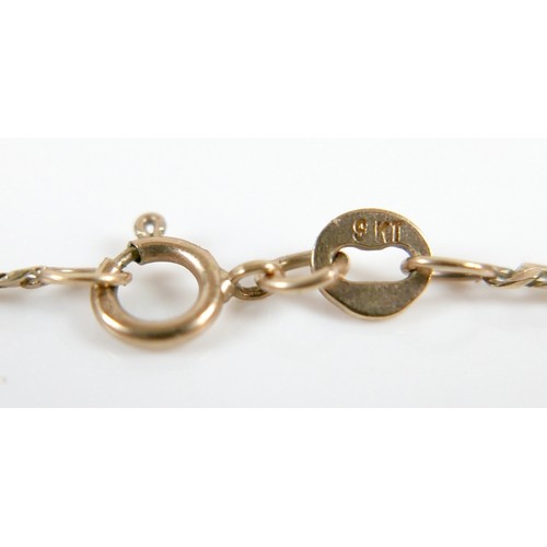 42 - A group of 9ct gold jewellery, including a cameo brooch inset with a single diamond, 2.2 by 2.5cm, 3... 
