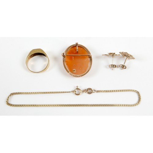 42 - A group of 9ct gold jewellery, including a cameo brooch inset with a single diamond, 2.2 by 2.5cm, 3... 