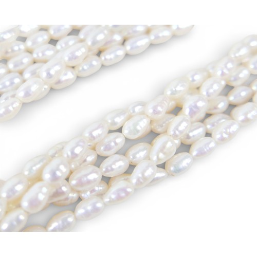 43 - A six strand necklace of natural freshwater pearls on 18k gold clasp, 42cm, maker CH, 76.5g, a 14 go... 