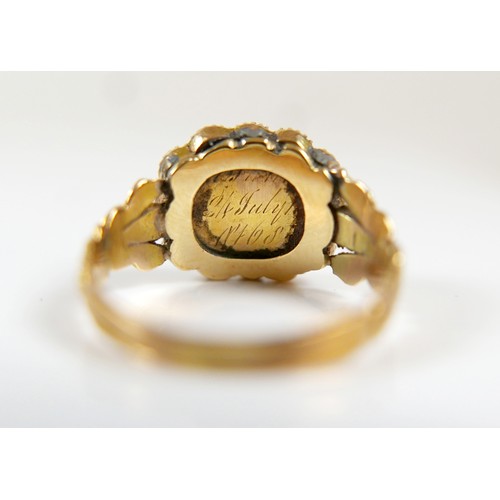 46 - A 19th century yellow metal and pearl mourning ring surface tests to approximately 18ct, head size 1... 