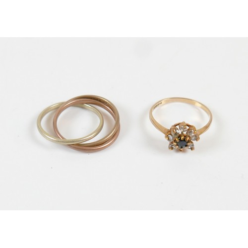 47 - Two 9ct gold rings consisting a tricolour 