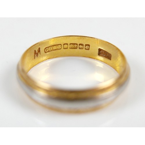 49 - A 22ct yellow and white metal banded ring size M, 4mm band, 3.1g.